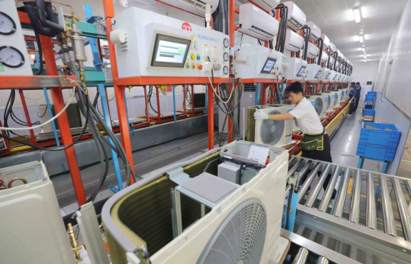Employees produce air conditioners in Anqing, Anhui province. 