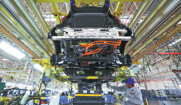 An employee works on an EV assembly line in Shijiazhuang, Hebei province, on Jan 8. An employee works on an EV assembly line in Shijiazhuang, Hebei province, on Jan 8.